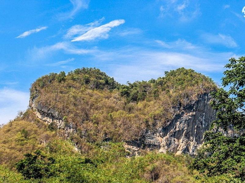 broken suspension bridge heart shaped mountain