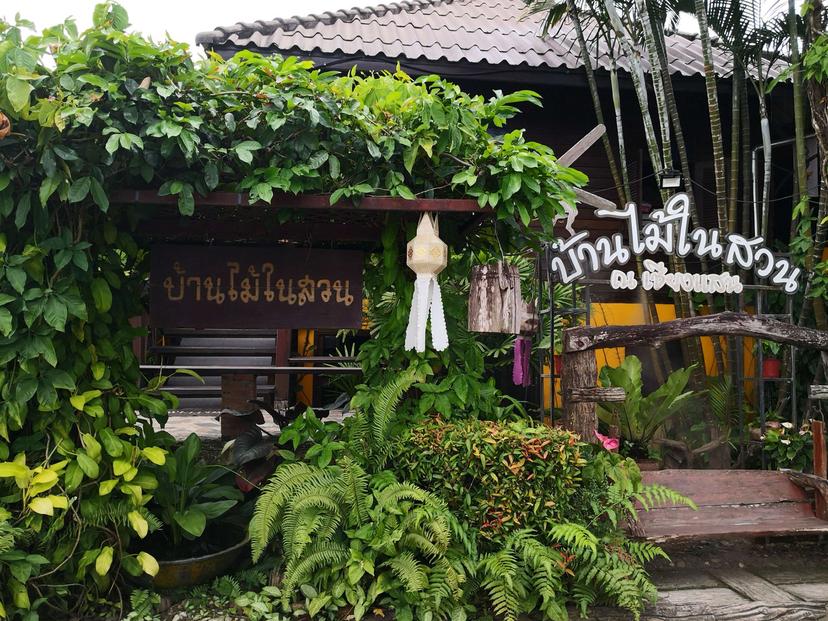 Wooden house in the garden at Chiang Saen