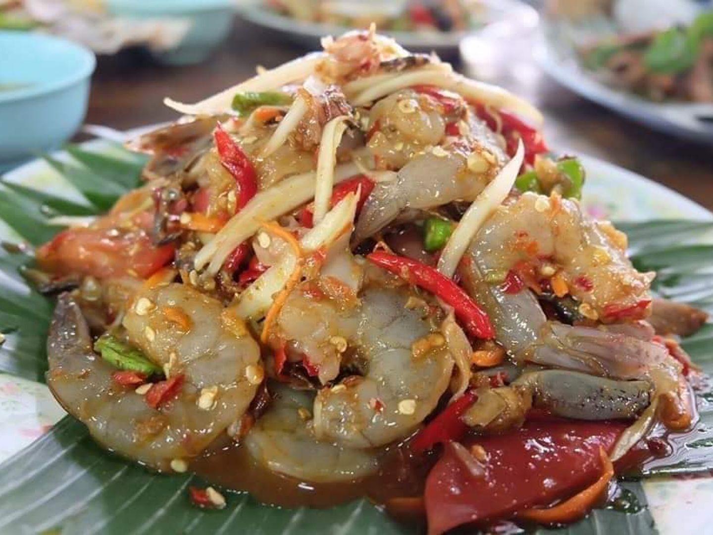 Two girls grilled chicken restaurant In front of Khun Dan Prakarnchon Dam